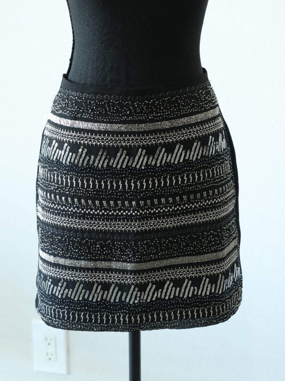 Sequined black mini skirt